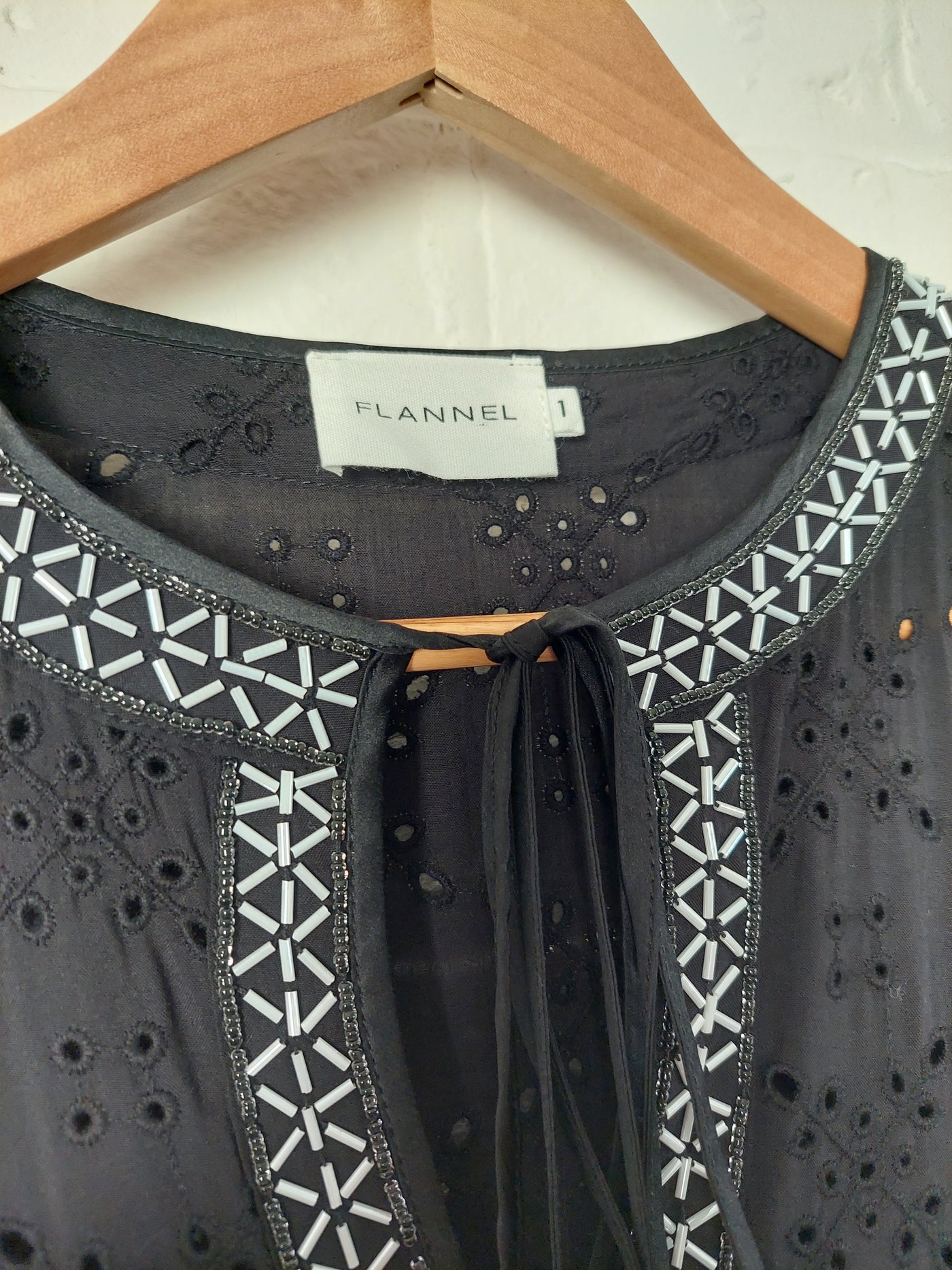 FLANNEL Designer V-neck black broderie dress with silk trim, Size 1 (AU 8-10)